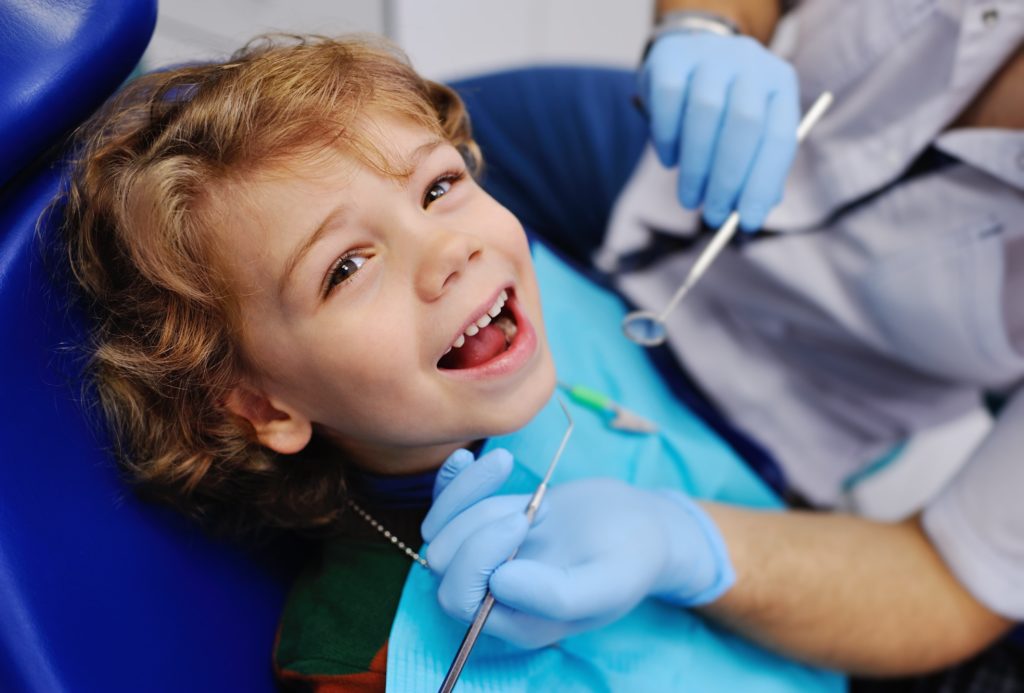 child in dental chair - Las Cruces, NM