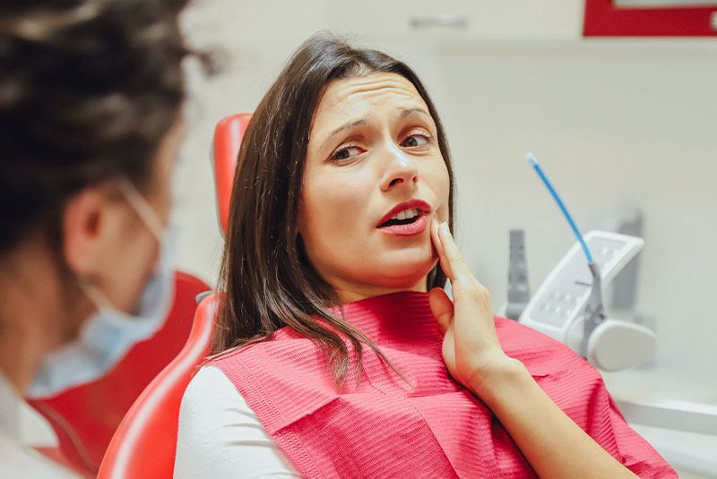 patient complaining about root canal pain